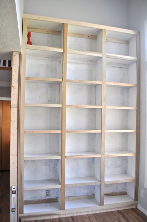 Diy Built In Bookshelves, Easy Diy Bookshelf, Diy Bookshelf Wall, Diy Bookshelf Ideas, Diy Built In Shelves, Diy Bookshelves, Built In Shelving, Floor To Ceiling Bookshelves, Built In Bookshelves