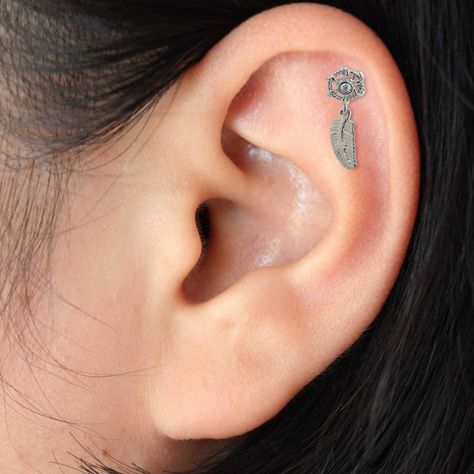 Check out this unique Dream Catcher Cartilage Stud. Description : Dream Catcher with Hanging Leaf Helix Tragus Piercing Material: 316L Surgical Steel Bar Size : 1.2x6mm Hand Made Jewelry (Price for 1 piece only) To see more of our collection, please follow/like our page! DM us for queries. Etsy Link: https://www.etsy.com/in-en/listing/785575699/dream-catcher-cartilage-stud-tragus?ref=shop_home_active_1088&pro=1&frs=1 . . . . . #fashionweek #fashionblogger #fashiongram #millenials #londonstre 16 Gauge Earrings, Unique Dream Catcher, Conch Piercing Ring, Hanging Leaf, Daith Rings, Tragus Ring, Gauge Earrings, Helix Hoop, Cartilage Stud