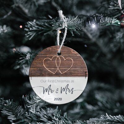 The Holiday Aisle® Congratulations! It’s you’re first year celebrating Christmas as a married couple! We’re so happy for you! Commemorate the moment with this Starfire prints hanging glass ornament featuring a rustic design on the dazzling, semi-translucent, light-catching glass. It comes with hanging string for easy display. Starfire prints hanging glass decoration Starfire prints hanging glass decorations are vivid, high-quality prints on sparkling, semi-translucent glass. These images are per Merry And Married Ornament, First Year Married Ornament, Laser Christmas, Cricut Ornaments, Engraving Ideas, Sale Ideas, Glass Decoration, Married Ornament, First Christmas Married