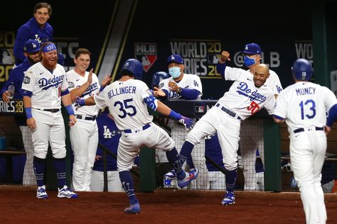 Photos: Dodgers take on Rays in World Series Game 1 https://www.ocregister.com/2020/10/20/photos-dodgers-take-on-rays-in-world-series-game-1/ Bellinger Dodgers, Let's Go Dodgers, Dodgers Win, Dodgers Nation, Kobe Bryant Poster, La Dodgers Baseball, Baseball World Series, Dodgers Girl, Mlb World Series