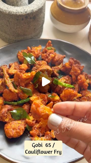 Annoos Recipes on Instagram: "#easyrecipe 🌿 Gobi 65 / Cauliflower Fry 🌿

.
❌❌ No Repost ❌❌ 

.
Cauliflower -400 gms
Turmeric powder-1/2 tsp
Salt -1/2 tsp
Boiling water

Ginger garlic paste -1 tsp
Red chilli powder-1 1/2 tsp
Turmeric powder-1/2 tsp
Cumin powder-1/2 tsp
Garam masala powder-1/2 tsp
Corn flour-1 tbsp
All purpose flour-2 tbsp 
Water -2 tsp
Salt to taste
Curry leaves 
Green chilli
Oil for frying 

.
#gobi65 #gobirecipes #cauliflower #cauliflowerfry #indianrecipes #quickrecipes #food #reels #annoosrecipes #reelsinstagram ##recipes #reelsindia #trendingreels #reelitfeelit #foodporn #vegetarian" Cauliflower Chilli Recipe, Gobi 65 Recipe, Gobi Fry, Cauliflower Fry, Gobi 65, Gobi Recipe, Gobi Recipes, Food Reels, Ginger Garlic Paste