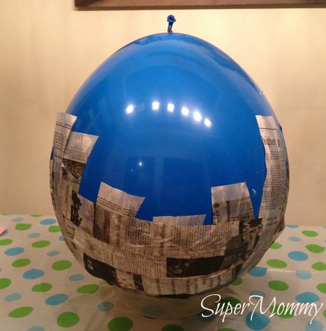 How to Make A Paper Mache Pinata How To Paper Mache A Balloon, Pinata Making, Paper Mache Pinata, Monster Pinata, Homemade Pinata, Diy Paper Mache, Pinata Diy, Kids Cabinet, Making Paper Mache