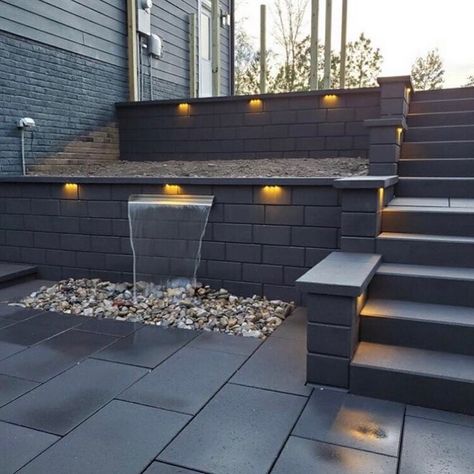 1,628 Likes, 19 Comments - Techo-Bloc (@techobloc) on Instagram: “All black everything! Loving this #RaffinatoWall & #BluGrande combo in #OnyxBlack by Taproot Land…” Boundary Wall Design, Backyard Retaining Walls, Inground Pool Landscaping, Compound Wall Design, Modern Patio Design, Design Backyard, Boundary Wall, Stone Landscaping, Compound Wall