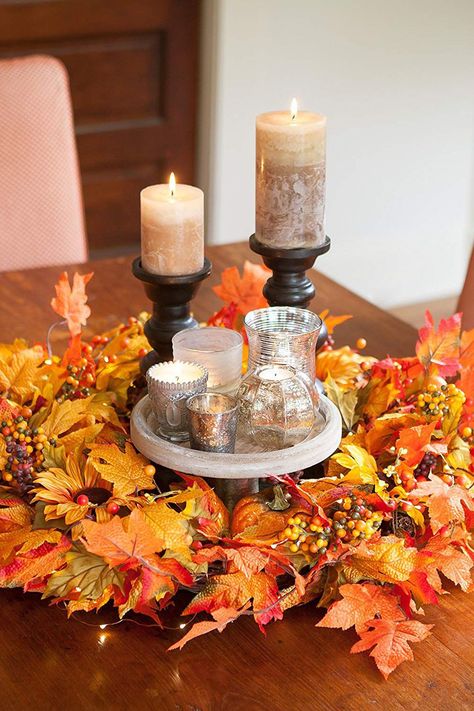 If you want to go the more traditional route, try this assembly of bright-orange foliage, berries, and faux sunflowers. It even comes threaded with 50 warm-white lights. Click through to see more of our favorite fall wreaths! (If you click to buy this product, we earn 💰!) #falldecorideas #autumndecorations #fallwreathideas #autumnwreaths #frontdoorwreaths Maple Leaf Wreath, Wreath Centerpiece, Homemade Wreaths, Simple Centerpieces, Diy Fall Wreath, Autumn Decorating, Autumn Lights, Autumn Wreath, Leaf Wreath