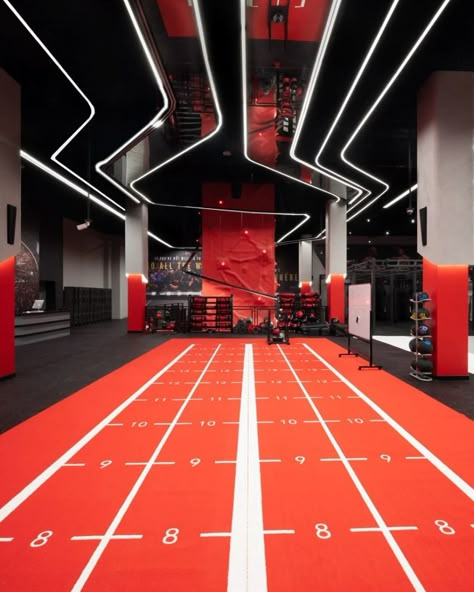 The “UFC GYM” located in Silicon Central, Dubai is a state-of-the-art fitness facility that offers a unique championship experience for its members. 
#lovethatdesign #ufcgym #gymdesign #corporate Logo Wall Ideas, Gym Branding Design, Futuristic Gym, Gym Ceiling, Motorcycle Showroom Design, Gym Mood Board, Gym Mood, Gym Architecture, Ufc Gym