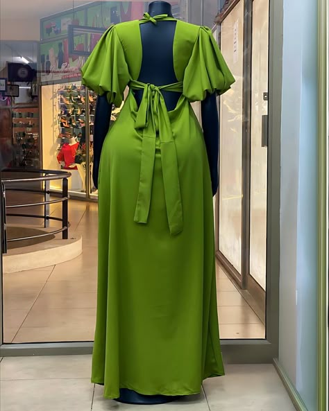 Taken 🫱🏽‍🫲🏾💚#madeinuganda 💚This vibrant green dress features a plunging V-neckline, puffed sleeves, and a flattering fit. The open back design with tie up straps adds a bold touch, while the flowing skirt creates an elegant silhouette…perfect for formal and casual occasions. #veevacouture Simple Casual Dress For Women, 2 Piece Dress Formal, Simple Dresses Casual Classy, English Style Clothes, Simple Gown Styles, Elegant Two Piece Outfit, George Styles, Simple Dress Design, Free Gown