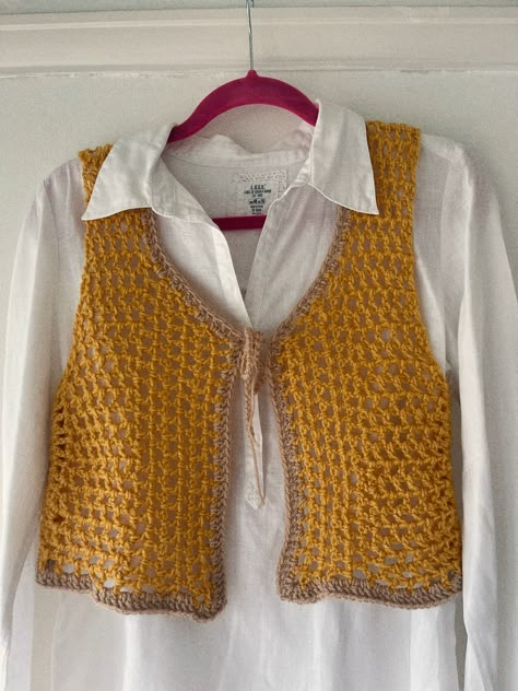 Mustard mesh crocheted waistcoat.. #KnittingPatterns #DIYKnitting #HandmadeKnits #KnittingInspiration #KnittingCommunity 70s Waistcoat, Top Down Crochet Cardigan, Crochet Mesh Vest, Knitting Patterns Men, Knitting Patterns Vest, Knitting Patterns Poncho, Knitting Patterns Socks, Vest Knitting Patterns, Crochet Vest Outfit