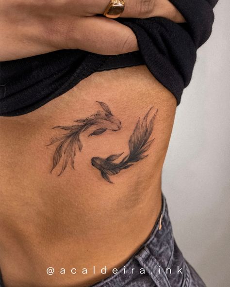 Koi Fish Tattoo On Stomach, Koi Fish Balance Tattoo, Pisces Rib Tattoo, Koi Fish Side Tattoo, Women Ribcage Tattoo, Koi Fish Rib Tattoo, Koy Fish Tattoo Ideas, Tattoos On Ribs For Women, Fish Rib Tattoo