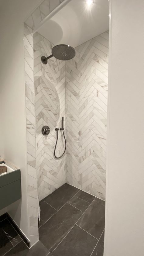 Marble glorious white herringbone Shower Remodel Herringbone, Large Marble Herringbone Floor, Master Bath Tile Shower Ideas Herringbone, Herringbone Tile Shower Wall, Bathroom Herringbone Tile, Octagon Tile Bathroom, Herringbone Shower Wall, Herringbone Shower Tile, Herringbone Shower