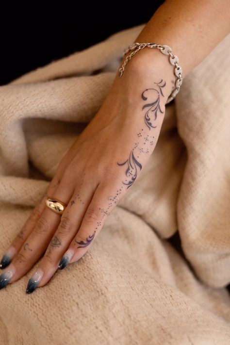 Dainty Hand And Wrist Tattoos, Hand Spiritual Tattoo, Hand Tattoos On The Side, Woman Hand Tattoo Design, Dainty Hand Tats, Small Feminine Hand Tattoos, Body Placement For Tattoos, Hand Tattoo Placement Ideas, Light Hand Tattoos