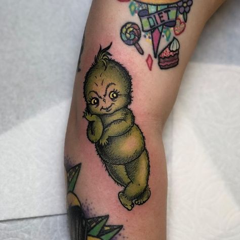 Kewpie Doll Tattoo, Kewpie Tattoo, Grinch Baby, Fandom Tattoos, Chest Tattoo Ideas, Baby Tattoo, Baby Grinch, Doll Tattoo, 13 Tattoos