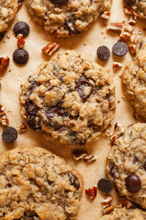 Coconut oatmeal chocolate chip cookies are sweet, chewy, and full of texture! Your favorite oatmeal chocolate chip cookie gets an upgrade with plenty of sweetened, shredded coconut. Coconut Oil Oatmeal Chocolate Chip Cookies, Oatmeal Chocolate Chip Nut Cookies, Choc Chip Oatmeal Cookies Recipes, Gourmet Oatmeal Cookies, Coconut And Oatmeal Cookies, Oatmeal Chocolate Chip Cookie Recipe Healthy, Oatmeal Chocolate Chip Cookies Healthy, Oat Coconut Cookies, Coconut Sugar Chocolate Chip Cookies