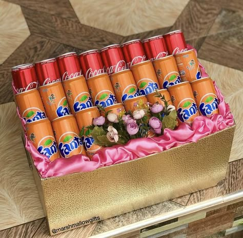 Soft Drinks wrapped in a gold box with pink satin for engagement dowry wrapping. Ghana Engagement Items Wrapping, Engagement Wrapping Ideas, How To Wrap Engagement Items In Ghana, Engagement Wrapping Ideas Ghana, Drinks Gift Basket, Engagement Hamper Ideas For Groom, Wedding Taals, Drink Gift Basket, Traditional African Wedding