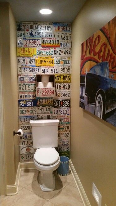 License Plate Wall  - Boys Bathroom License Plate Wall Art, Weird Bathroom Ideas, License Plate Wall Ideas, Car Bathroom Decor, Car Plates Decoration, License Plate Decor Wall Art, Vintage License Plate Decor, Mancave Bathroom Ideas, License Plate Art Wall