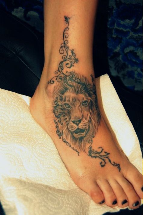 Lion Thigh Tattoo, Vine Foot Tattoos, Skin Tear Tattoo, Lion Tattoo Images, Skull Thigh Tattoos, Lion Tattoo On Thigh, Corset Tattoo, Skull Hand Tattoo, Lioness Tattoo