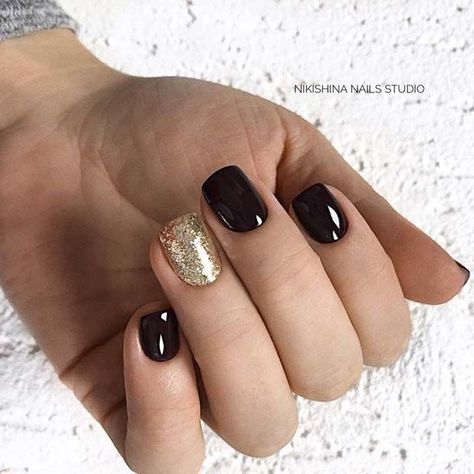 Black Nails With Gold Accent Nail, Black With Gold Glitter Nails, Black Nails Gold Glitter, Nails With Gold Glitter Accent, Black And Gold Gel Nails, Black Nails With Gold Glitter, Black And Gold Nail Designs, Black Nails With Gold, Nails With Gold Glitter