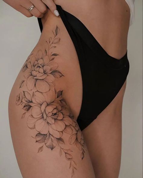 - browse through our collection of the most beautiful thigh tattoos for women. #thightattoos #womenstattoos Thigh Rib Tattoo, Floral Thigh Hip Tattoos Women, Floral Tattoo Thigh Hip, Woman’s Thigh Tattoo Ideas, Hip Tatoos Woman, Beautiful Thigh Tattoos, Floral Hip Tattoo Thigh Piece, Flower Hip Tattoo Thigh Piece, Pretty Thigh Tattoos For Women