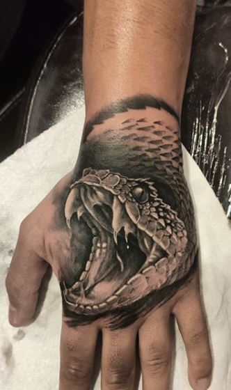 75 Trendy Snake Tattoos Designs, Ideas and Meanings - Tattoo Me Now Dragon And Snake Tattoo Design, Cool Snake Tattoos For Men, Snake Sleeve Tattoos For Guys, Hand Tattoos Snake, 3d Snake Tattoo, Snake Hand Tattoos, Evil Snake Tattoo, Snake Tattoos Forearm, Diamond Back Snake Tattoo