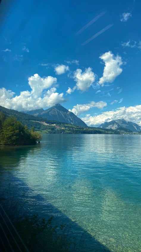 Mountain. lake. train ride. Switzerland. Travel. Sky Swiss Alps Aesthetic Summer, Interlaken Aesthetic, Interlaken Switzerland Aesthetic, Switzerland Beach, Swiss Alps Aesthetic, Swiss Alps Summer, Summer In Switzerland, Switzerland In Summer, Switzerland View