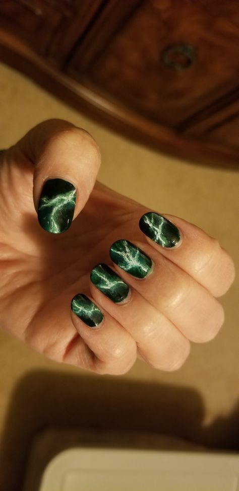 My Hero Academia inspired nails.  Dark green background with bright green lightning.  Based on Deku's green lightning Green Lightning Nails, Deku Nails Art, Deku Nails, Hulk Nails, My Hero Academia Nails, Mha Nails, Bolt Nails, Nail Ideas Art, Lightning Bolt Nails