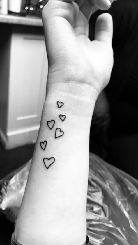 Hand Written Heart Tattoo, Cute Hearts Tattoo, Hearts On Hand Tattoo, Hearts On Arm Tattoo, Stacked Hearts Tattoo, Multiple Hearts Tattoo, Hand Drawn Heart Tattoo Placement, Hand Drawn Heart Tattoo Family, Mini Hearts Tattoo