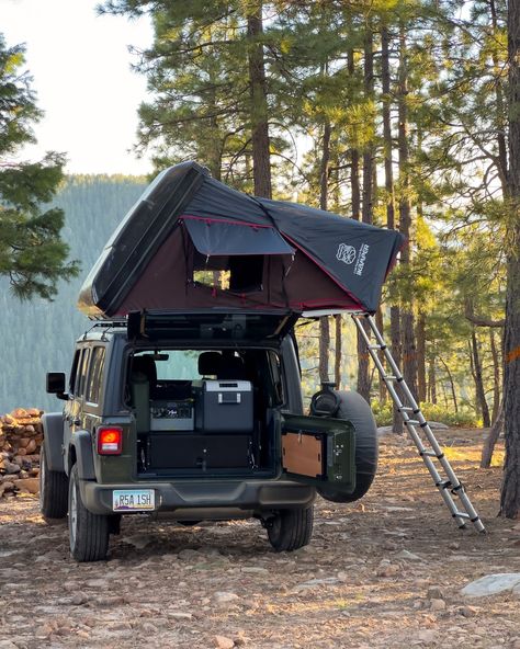 In case you’ve got that summer camping trip on your mind: Nicks🏕️ Our 2022 4 door Jeep Wrangler is ready for you to take camping! It features an iKamper SkyCamp Mini Roof Top Tent (EASY 2 minute setup and takedown) 😎 Equipped for you to sleep comfortably 🌙 with a full size mattress pad, down Ripstone nylon blanket/ cotton sheets, 2 warm weather sleeping bags and 2 pillows. Cooking setup 🍳includes a Dometic CFX3 35L Electric Fridge, Front Runner Drawer Kit, Front Runner Drop Down Tailgate T... Wrangler Camping, Jeep Wrangler Camping, Overland Jeep, 4 Door Jeep Wrangler, Rooftop Tent, Jeep Camping, Full Size Mattress, Summer Camping, Front Runner