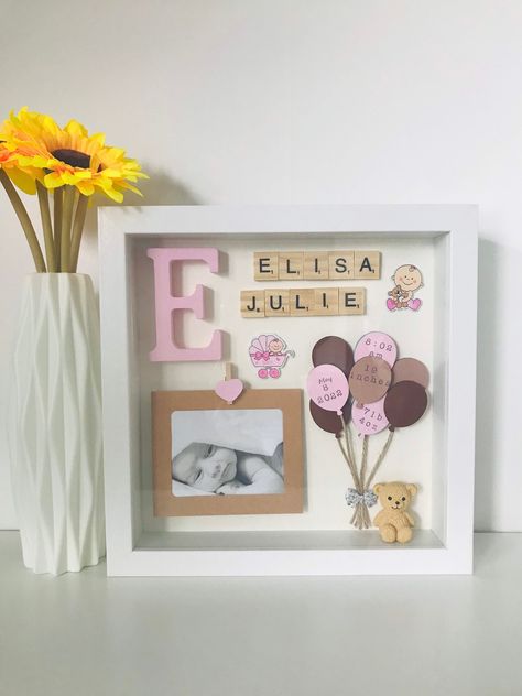 This frame is a beautiful gift for new baby girl or boy with personalized baby name or names and details like date of birth, time, birth weight, or height. You can decide what information you want me to put in the frame. 2-4 hearts of equal or different sizes will be used depending on how much personalized details will need to fit in the frame. Frame Size: 10x10x2 inches (25x25x4.5cm) Frame will fit the photo of approximate size 3.5x2.5 inches or 7x9cm (the picture might need to be cut down to s Shadow Box For Baby Girl, Birth Memory Frame, Newborn Personalized Gifts, Birth Frame Ideas, Baby Name Frame, Homemade Frames, Nametags For Kids, Baby Birth Gifts, Baby Books Diy