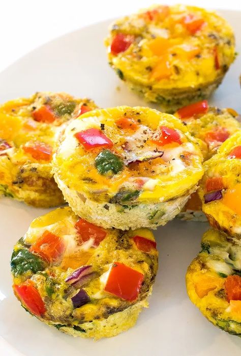 These delicious and easy egg muffin cups are a great way to meal-prep a healthy breakfast or snack and keep it stocked in your freezer any time you need it! Also great for school lunches and road trips. Easy Road Trip Meals, Egg Cups Breakfast Healthy, Make Ahead Breakfast Muffins Egg Cups, Easy Healthy Egg Muffin Cups, Freezer Eggs, Ww Egg Cups Breakfast, Meal Prep Egg Muffins Freezer Breakfast Sandwiches, Keto Breakfast Cups Egg Muffins, Easy Egg Muffins