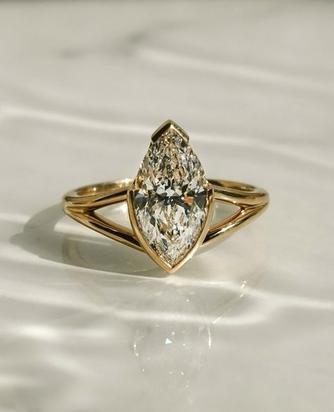 Frank Darling Custom Rings | There's something about split shank engagement rings that we can't keep our eyes off of.⁠ ⁠ This marquise diamond was set in an open basket… | Instagram Half Bezel Setting, Half Bezel, Split Shank Engagement Rings, Bezel Engagement Ring, Yellow Gold Solitaire, Engagement Ring For Her, Split Shank Ring, Zierlicher Ring, Split Shank