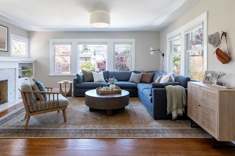 Earth tone living room with blue sectional by Marin County interior designer California Daydreams. Gray And Navy Living Room, Blue Sectional Living Room, California Design Interior, Vibe House, Newlywed Home, Navy Living Room, Blue Couch Living, Family Friendly Living Room, Blue Sofas Living Room