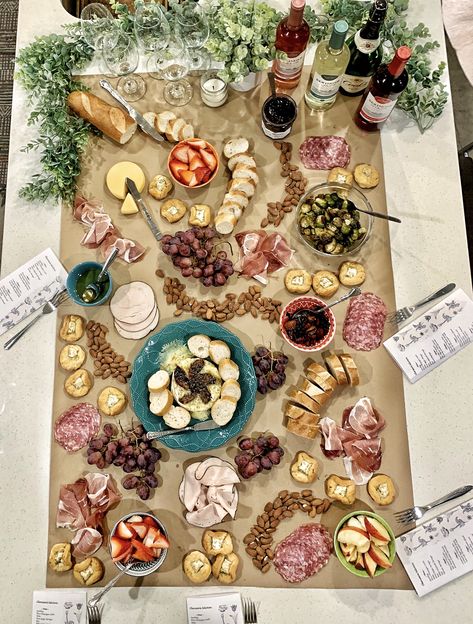 First and favorite charcuterie board for my roommates! Made personal menus and used butcher paper to setup. Charcuterie Brown Paper, Charcuterie On Countertop, Charcuterie Board On Parchment Paper, Charcuterie Board Ideas Butcher Paper, Charcuterie On Brown Paper, Butcher Paper Charcuterie Table, Charcuterie Board On Paper, Charcuterie Board On Brown Paper, Parchment Paper Charcuterie Board