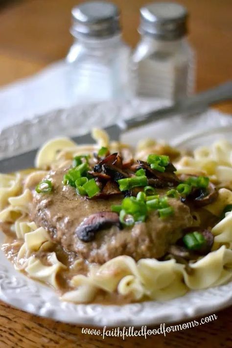 This super easy Crock Pots Salisbury Steak recipe is made with frozen patties and only has FOUR ingredients! It is one of our Slow Cooker favorites. Made with Cream of Mushroom Soup or Cream of Chicken, either way it turns out amazing with a yummy creamy gravy sauce. Definitely a go to for a budget friendly meal. #crockpot #slowcooker #frozenpatties #SalisburySteak #gravy #dinner #easyrecipe #comfortfood #Cheapdinner Slow Cooker Salisbury Steak Super Easy, Frozen Hamburger Patties Recipes Crock Pot, Crockpot Salisbury Steak, Easy Frozen Meals, Salisbury Steak Crockpot, Beef Patties Recipes, Easy Salisbury Steak, Hamburger Recipes Patty, Salisbury Steak Recipe