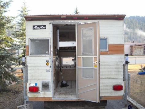 We got this 1979 camper for free! It was a ton of work to clean, paint and add flooring and carpet but we are camping in it for our 2nd year! I do have a few fi… Cab Over Camper, Cabover Camper, Camper Bar, Camper Flooring, Slide In Truck Campers, Camper Redo, Glamper Camper, Air Stream, Pickup Camper