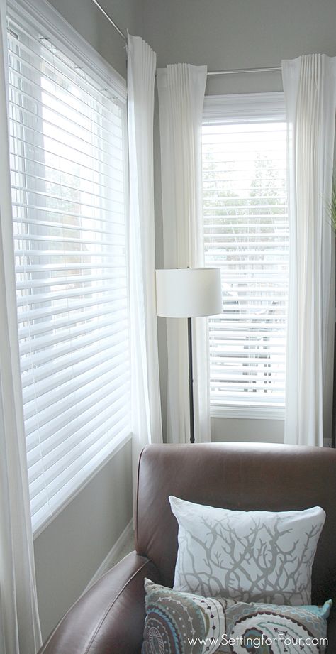 These are GORGEOUS! Beautiful window treatments with the CLASSIC look of shutters without the big price tag!!! How to install horizontal blinds. Kitchen Window Treatments With Blinds, Blinds For Small Windows, Family Room Window Treatments, Blinds And Curtains Together, White Faux Wood Blinds, Family Room Windows, White Blinds, Living Room Blinds, Bedroom Blinds