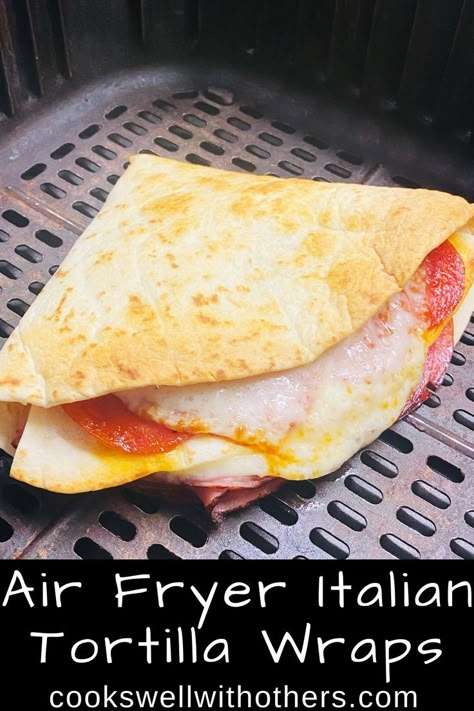 four way folded wrap in air fryer Air Fryer Italian Wraps, Air Fry Wraps, Air Fryer Garlic Bread Tortilla, Air Fryer Tortilla Roll Ups, Air Fryer Panini, Airfryer Tortilla Wraps, Tortilla Fold Wrap, Air Fryer Tortilla Wraps, Air Fryer Tortilla Recipes