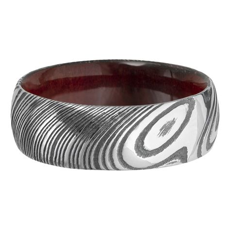 This captivating Damascus steel wedding band showcases vibrant texture and luster. Poised and polished to perfection, an exotic natural wood sleeve adds more to admire. The rounded edges of the 8-millimeter band create a comfortable all-day fit, your symbol of always forged to last forever. Damascus features a commanding blend of two kinds of stainless steel. Becoming more durable at the hand of a skilled artisan, Damascus bands feature carefully twisted and folded layers with one-of-a-kind patt Damascus Wedding Band, Damascus Steel Wedding Band, Damascus Ring, Damascus Steel Ring, Helzberg Diamonds, Matching Wedding Bands, Wedding Band Ring, Agate Ring, Wedding Matches