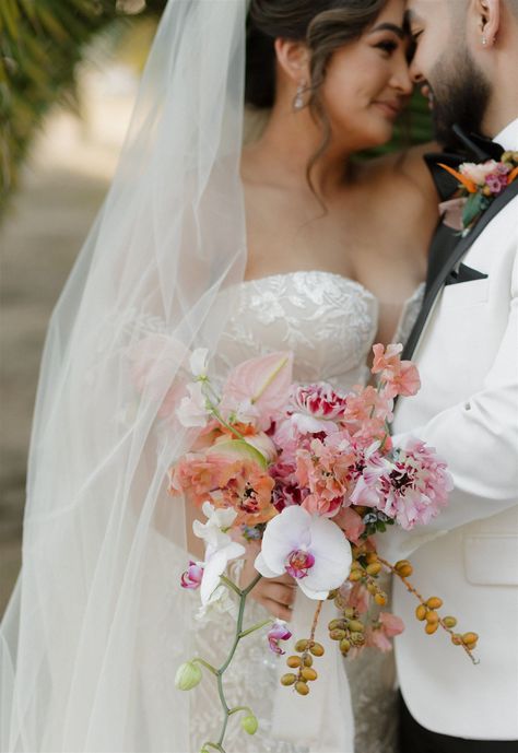 Petite tropical bridal bouquet in spring color palette. Orchids, Charlotte ranunculus, anthuriums, sweet peas. Orchid In Bouquet, Flower Bouquet With Orchids, Orchid Color Wedding, Wedding Bouquet Orchids, Pink Orchids Bouquet, Small Bridal Bouquet, Sweet Pea Bouquet, Orchid Bridal Bouquets, Orchids Wedding