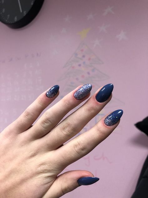 Dark Blue And Silver Sparkle Nails, Navy Nails Design Winter, Navy Blue Nail Art Silver Glitter, Short Navy Blue Nails Art Designs, Dark Blue Almond Nails Short, Navy Blue Nails With Silver Glitter, Nail Art Biru Navy, Dark Blue And Silver Nail Designs, Blue Silver Nail Art