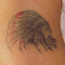 1) Native American Head : Johnny’s first tattoo is a Cherokee Indian chief head on his right bicep, honoring his Native American bloodlines. “I started getting tattoos when they were sort of verboten in Hollywood… 1983, 1984. I was 17 when I got the first one [a Cherokee chief, to honor] my Indian heritage.” Chief Head Tattoo, Body Journal, Cherokee Indian, Michelle Rodriguez, Indian Chief, Head Tattoos, Professional Tattoo, Indian Heritage, S Tattoo