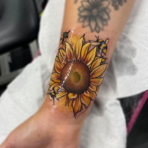 Vibrant Sunflower tattoo, with 3 little Bees. Sunflower And Honey Bee Tattoo, Bee Watercolor Tattoo, Bee And Sunflower Tattoo, Sunflower Bee Tattoo, Bee Tattoo Stencil, Sunflower And Bee Tattoo, Bees Tattoo, Tattoo Bee, Tattoos Sunflower