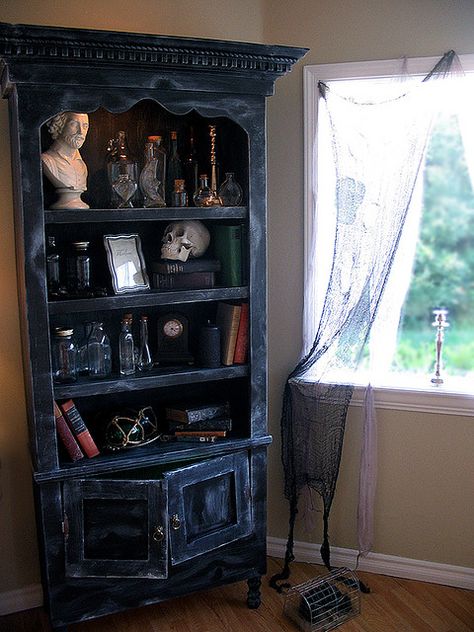 Potion Cabinet - I have a cabinet just like this one that I've wondered what i was going to do with... A little paint, some distressing... voila. Potion Cabinet. Bookshelf Altar, Potions Cabinet, Altar Bookshelf, Potion Cabinet, Window Inspiration, Beautiful Bookshelf, Altar Ideas, Dark Decor, Witches Altar