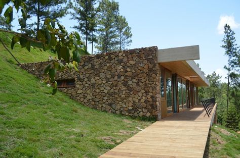 RD House. Location: Jarabacoa, Dominican Republic; architects: VASHO; photo: Eduardo Abreu; year: 2013 House Built Into Hillside, Earth Sheltered Homes, Grass Roof, Earth Sheltered, Hillside House, Underground Homes, Earth Homes, Earthship, Eco House