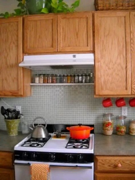 spice rack over the stove Spice Shelves Above Stove, Shelves Above Stove, Spice Rack Over Stove, Shelf Backsplash, Homemade Shelves, Light Cabinets, Hanging Mugs, Family Journal, Spice Shelf