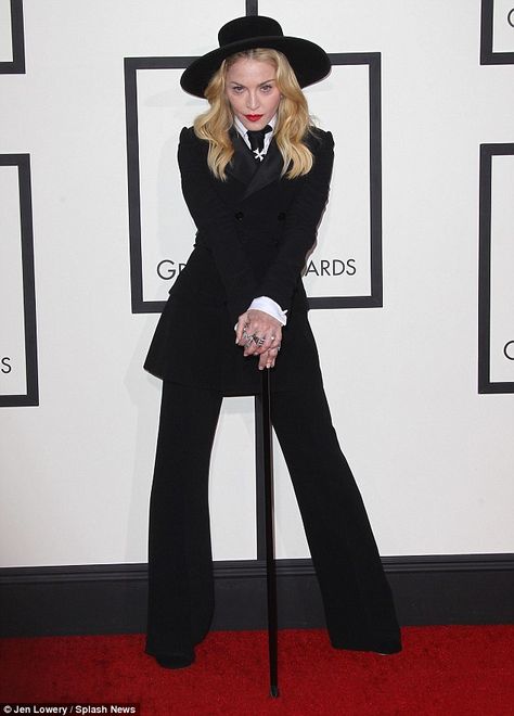 Have canes become cool? Madonna needed a cane at the Grammy Awards after she bruised a bone while dancing in heels Grammy Awards Red Carpet, Black Pant Suit, Grammys Red Carpet, Bloc Party, Swinging London, On The Red Carpet, Walking Sticks, Doja Cat, Red Carpet Dresses