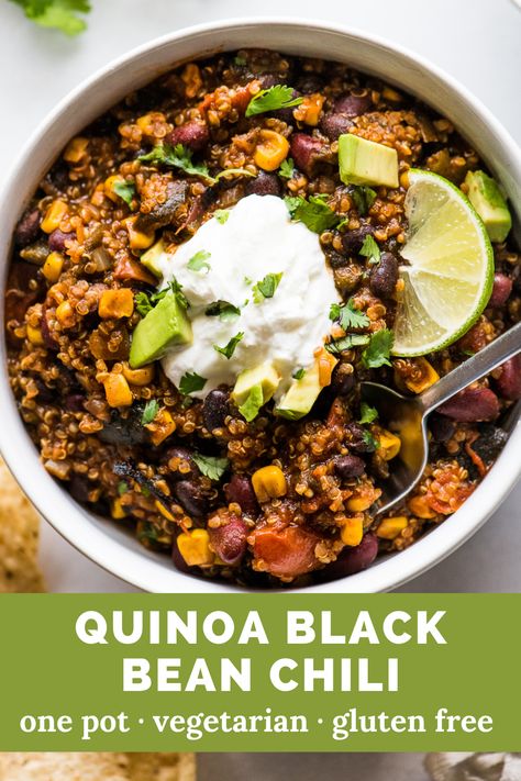 looking down at a bowl of black bean and quinoa chili with a dollop of sour cream and a lime wedge on top. Black Bean Quinoa Chili, Black Bean And Quinoa, Vegan Weeknight Meals, Chili Recipe With Black Beans, Chili Recipe Healthy, Isabel Eats, Quinoa Chili, Healthy Chili, Chili Beans