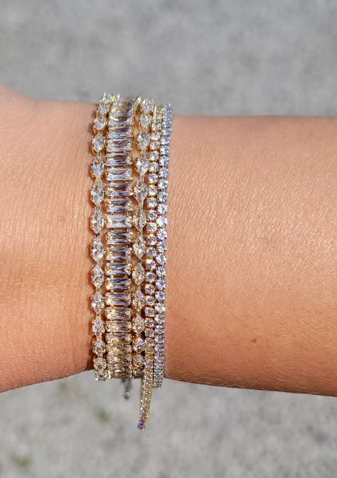 Calling all tennis bracelet lovers! Crafted with premium S925 sterling silver, this diamond tennis bracelet is a must-have for any collection. Not only is it durable and stylish, it comes in a variety of mesmerizing colors to perfectly accessorize any outfit.