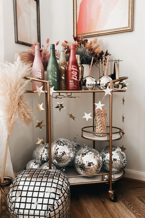 Mirror Ball Home Decor, Bowl Of Disco Balls, Bar Cart Disco Ball, How To Style A Disco Ball, Disco Kitchen Aesthetic, Disco Ball Holiday Decor, Disco Ball Arrangement, Disco Ball Apartment Decor, Disco Ball Bar Cart