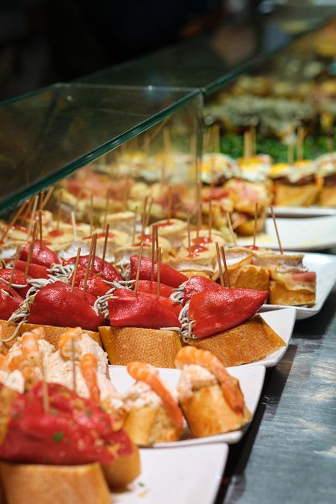 The Ultimate Guide To Pintxo Bar Hopping Roquefort Cheese, Blood Sausage, Sweet White Wine, Bar Hopping, Fruit Compote, Skewers Grill, Spicy Tomato Sauce, Spanish Tapas, Roasted Peppers