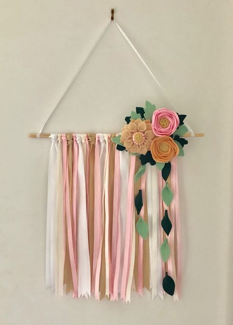 Ribbon and felt flower wall hanging. White, gold, pink and ivory. Home decor ideas. For nursery or kids bedrooms, teens and adults. Anywhere you want to add a little vintage style. Bedroom Design Diy, Ribbon Wall, Flower Wall Hanging, Pink Bedroom Decor, Gold Wall Decor, Ribbon Garland, July 9th, Hanging Flower Wall, Kids Bedrooms