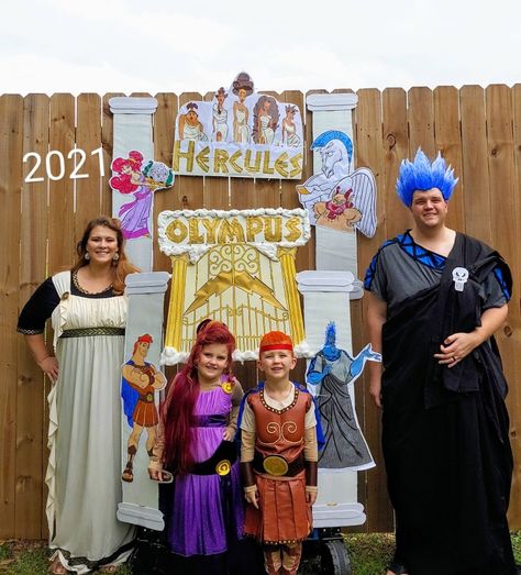 DIY Family Disney Halloween costumes Hercules Hercules Trunk Or Treat, Hercules Halloween Costume Family, Diy Hercules Costume, Hercules Family Costume, Hercules Disney Costume, Family Disney Halloween Costumes, Hercules Disney Party, Halloween Hercules And Meg, Meg Cosplay Hercules